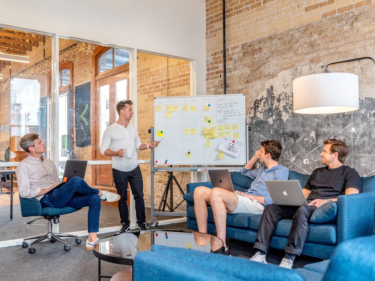 Professional web design consultation meeting between agency expert and business client